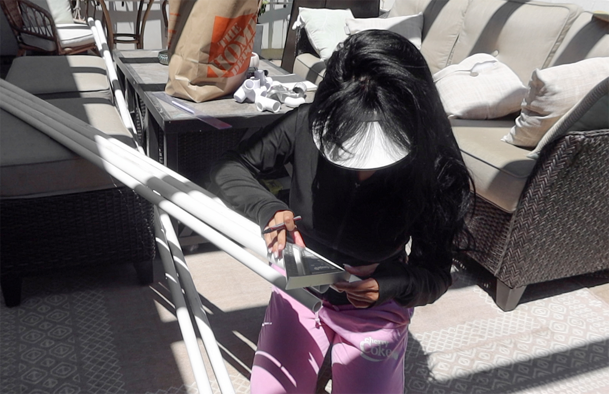 Cutting PVC frame structure for newborn posing table